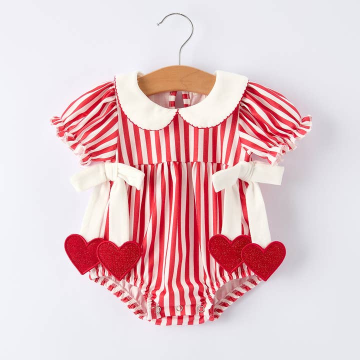 Valentine's Red Stripe Heart Bubble Romper for Baby Girls and other Purchase Wholesale ryse. Free Returns & Net 60 Terms on Faire trending on Faire.