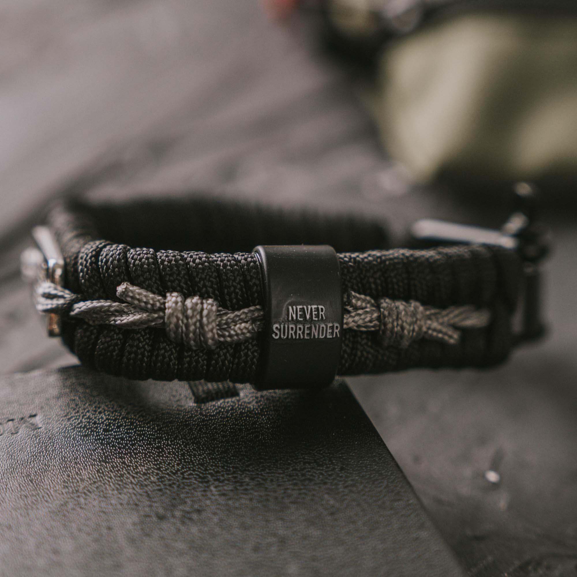 The Hero Company - Wholesale Woven/Braided Bracelet - The Hero Company- Never Surrender Barbed Wire Paracord Bracelet: Helps Pair Veterans With A Service Dog Or Shelter Dog- Faire8