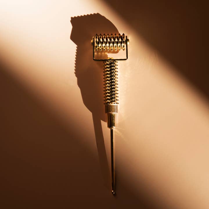 Le Ridoki d'acupression doré pour la vente par Roll On Jade