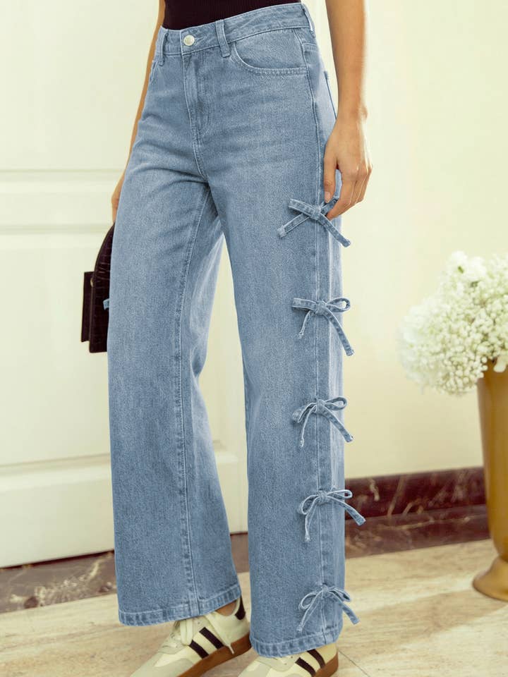 Jean droit à jambes larges avec nœud latéral. pour la vente par 1 the Woman
