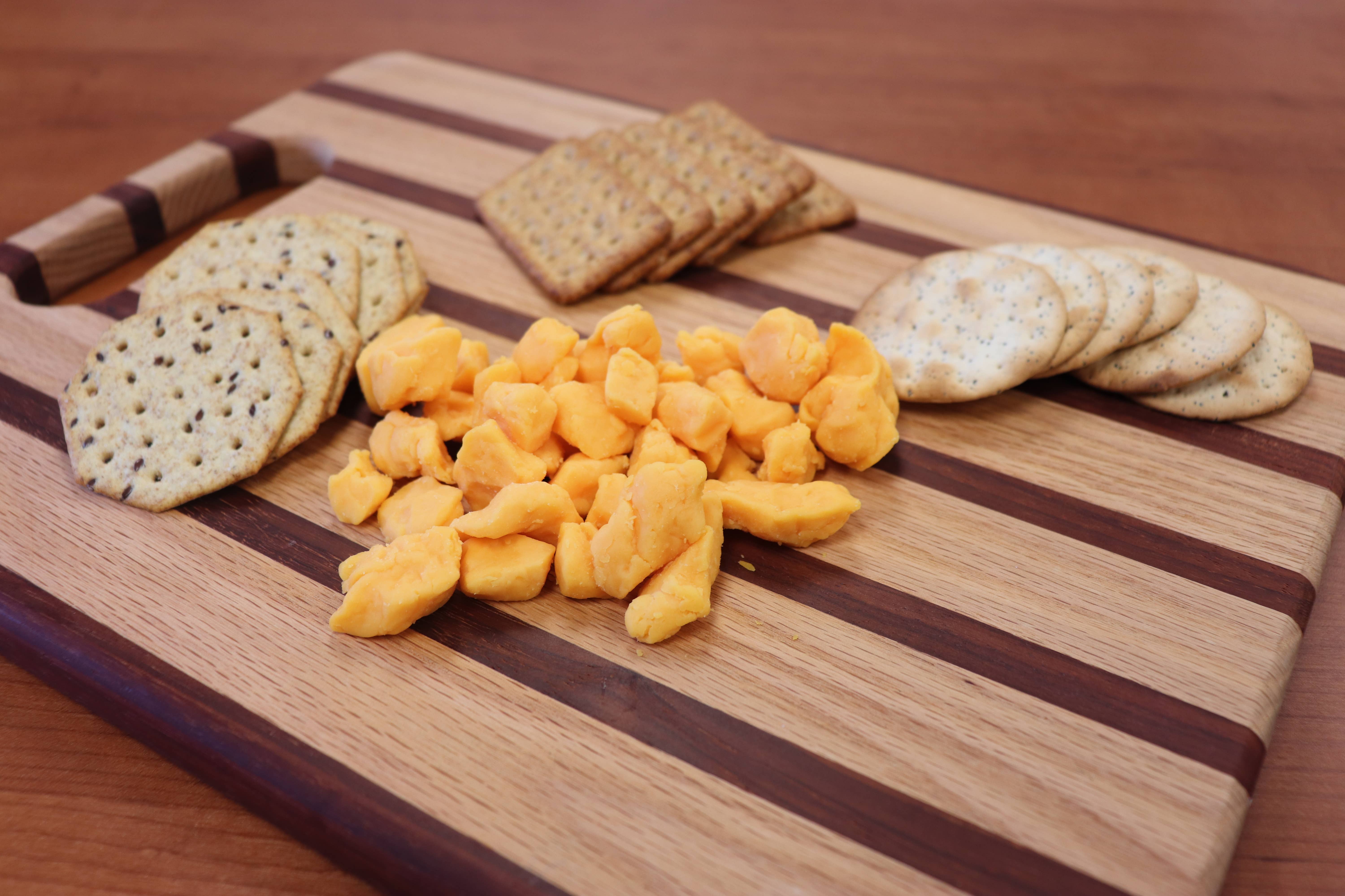 Alma Creamery LLC - Wholesale Cheese - 8 oz. Buffalo Wing Flavored Cheese Curds1