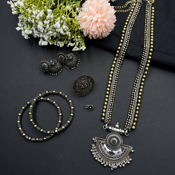 Handmade Indian Oxidized Jewelry Set with Ghungroo Pendant for wholesale by Vastrabhushan