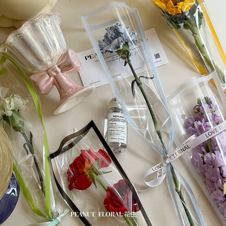 Manchon en cellophane à bord coloré pour fleur unique pour la vente par Elegant Design Supply