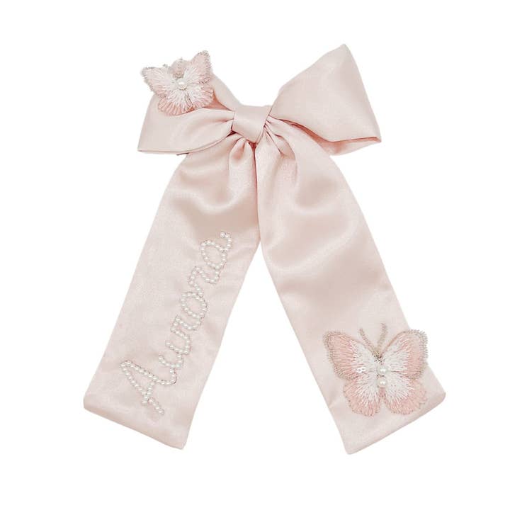 Blush Pearl Butterfly Bow for wholesale by Bebe Theory