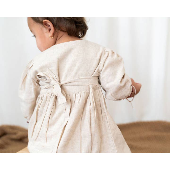 Natural Ravello Embroidered Baby Dress & Bloomer (Linen Blend) for wholesale on Faire9