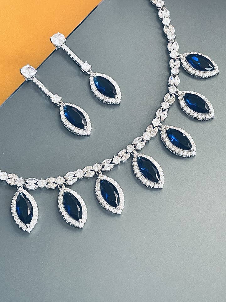 KINSLEY - Sapphire Blue Marquise-Shaped CZ And Matching Drop Earrings In Silver for wholesale by JohnnyB Jewelry