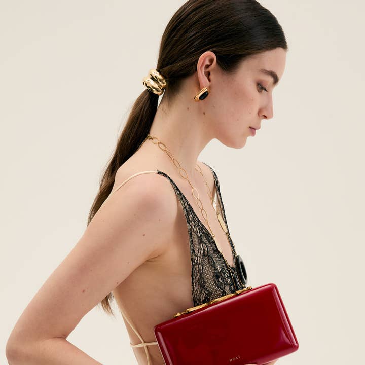 MOLLY CLUTCH SNAKE CLOSURE VARNISH-N65 for wholesale by NALI'