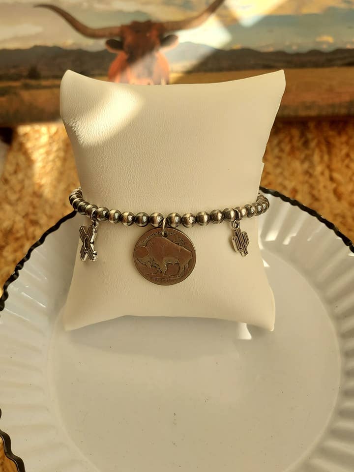 Outlaw charm bracelet for wholesale by The peachy cactus boutique