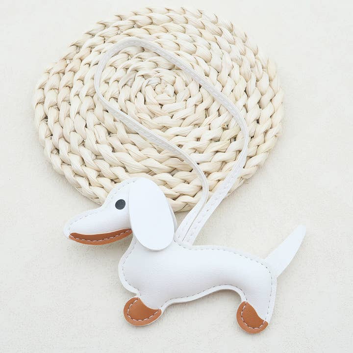 Cute Leather Dachshund Keychain and other Purchase Wholesale dog key chain. Free Returns & Net 60 Terms on Faire trending on Faire.