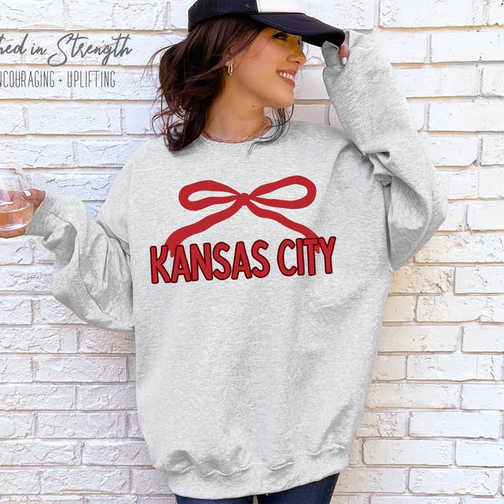 Kansas City Red Coquette Bow Football Sweatshirt for wholesale by Clothed in Strength