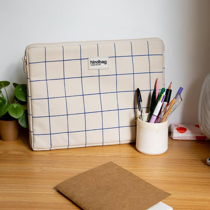 Ava Checkered Ecru/Blue Laptop Sleeve and other Purchase Wholesale m c. Free Returns & Net 60 Terms on Faire trending on Faire.