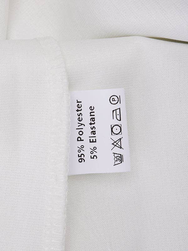 PRETO BRANCO Casaco de gola alta com manga longa, corte solto, estampa floral em cores contrastantes e abertura lateral para venda a revendedores na Faire20