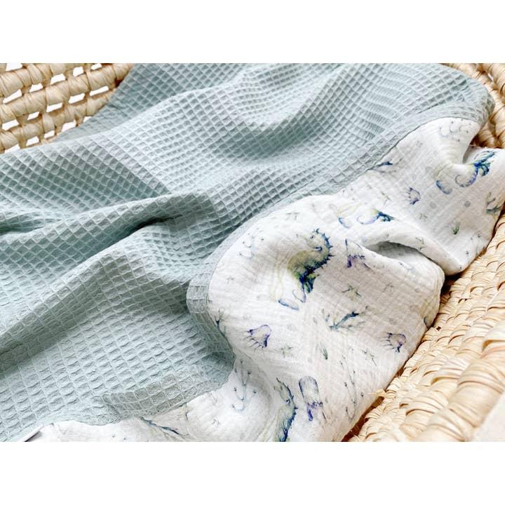 Newborn blanket - green seahorses for wholesale by Natural Cuddles