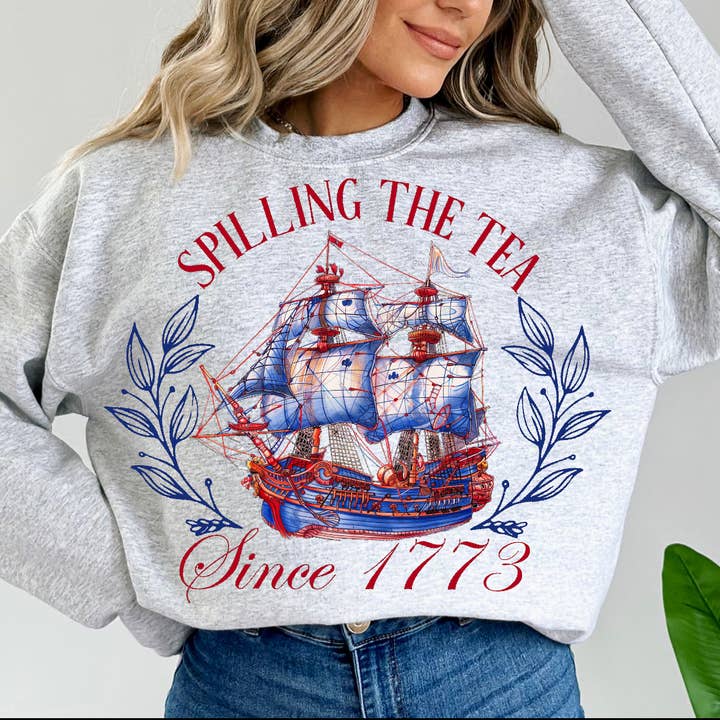 Spilling the Tea Since 1773 Short Sleeve Shirt for wholesale by Blazing Oaks Clothing Company