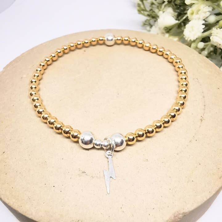 Bracciale in oro con perline Lightning Bolt per la vendita all'ingrosso da parte di Sophellie Jewellery