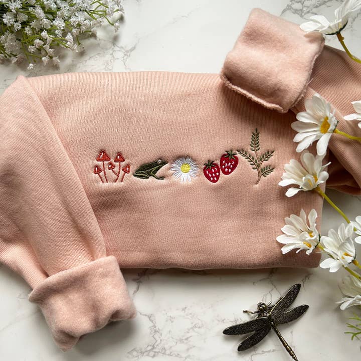 Embroidered Cottagecore Nature Frog Mushroom Sweatshirt for wholesale by Plantiful Design Co