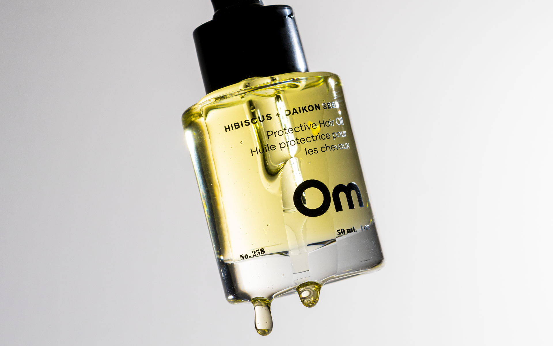 Om Organics Skincare - Wholesale Hair Oil - Hibiscus + Daikon Seed Protective Hair Oil6