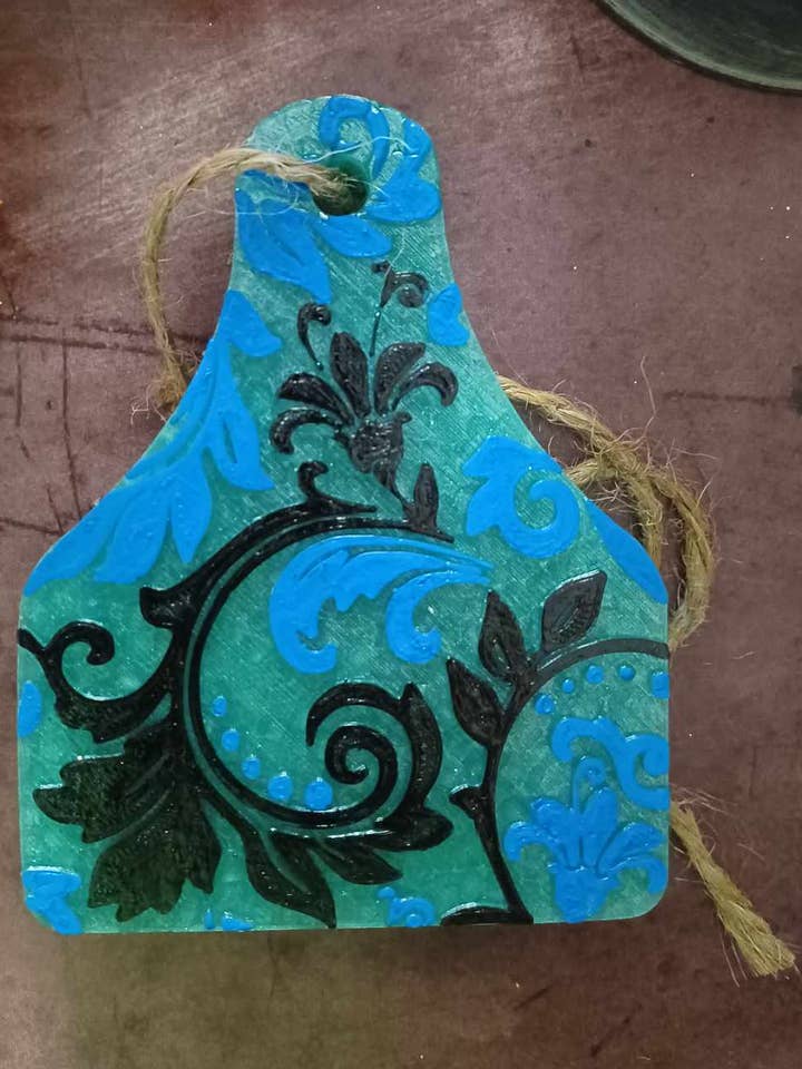 Cow Tag Tooled Läder Fäste för wholesale av Southern Scents Fragrances, Inc.