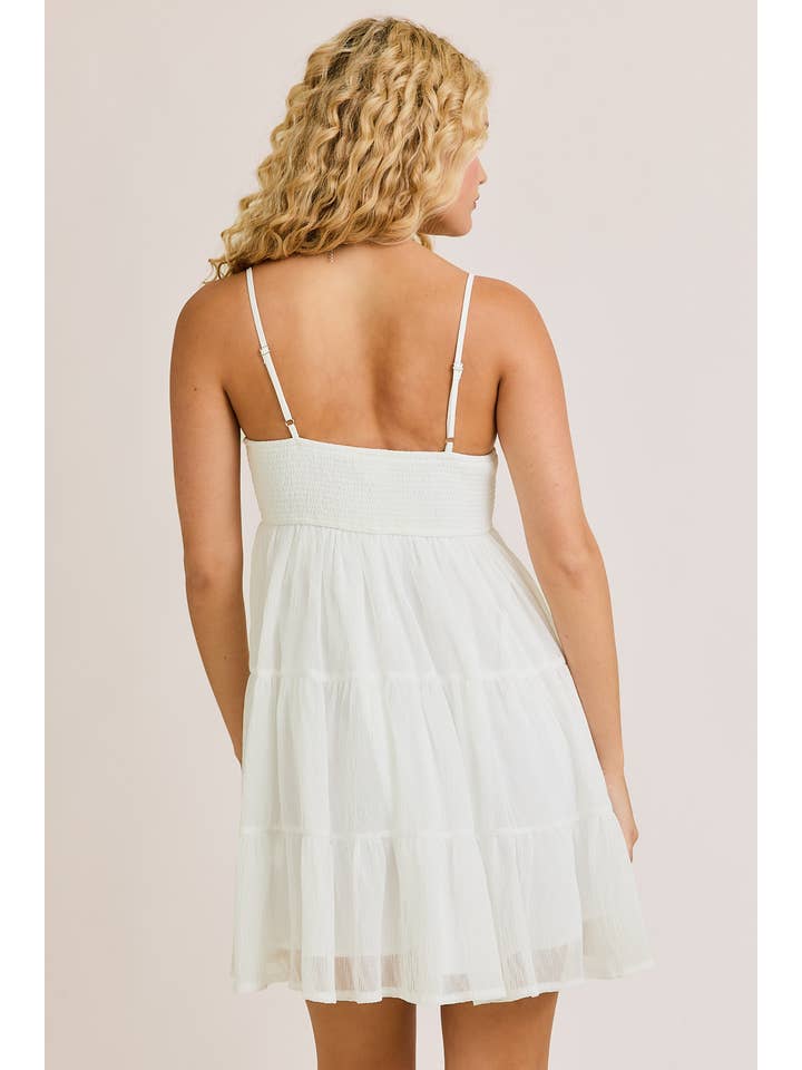 White SMOCKED TIERED MINI DRESS for wholesale on Faire