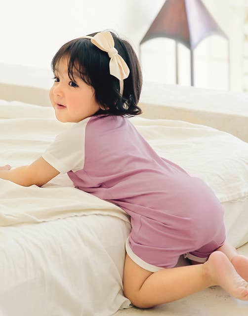 Bamboo Smile Purple Baby Romper for wholesale on Faire3