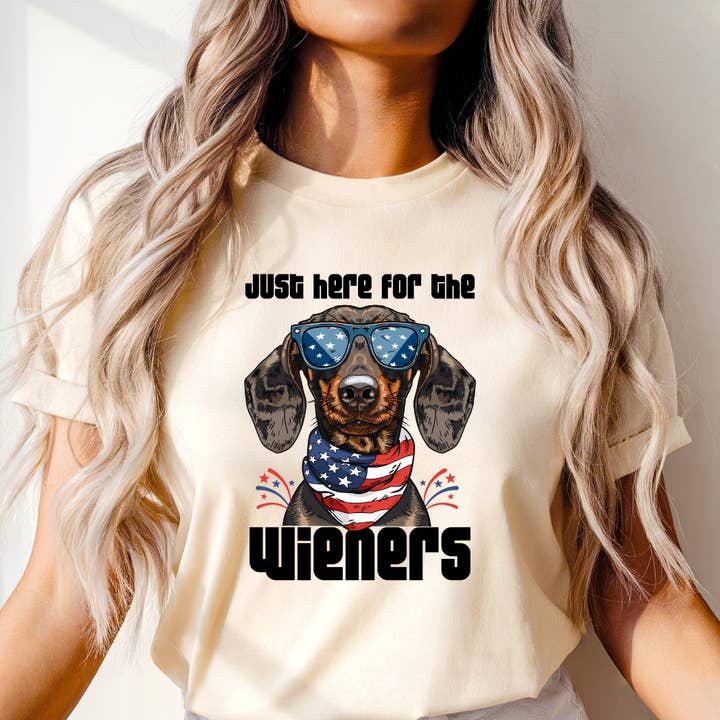 Just Here For The Wieners 4th of July Graphic Tee for wholesale by Happy Mail Wholesale