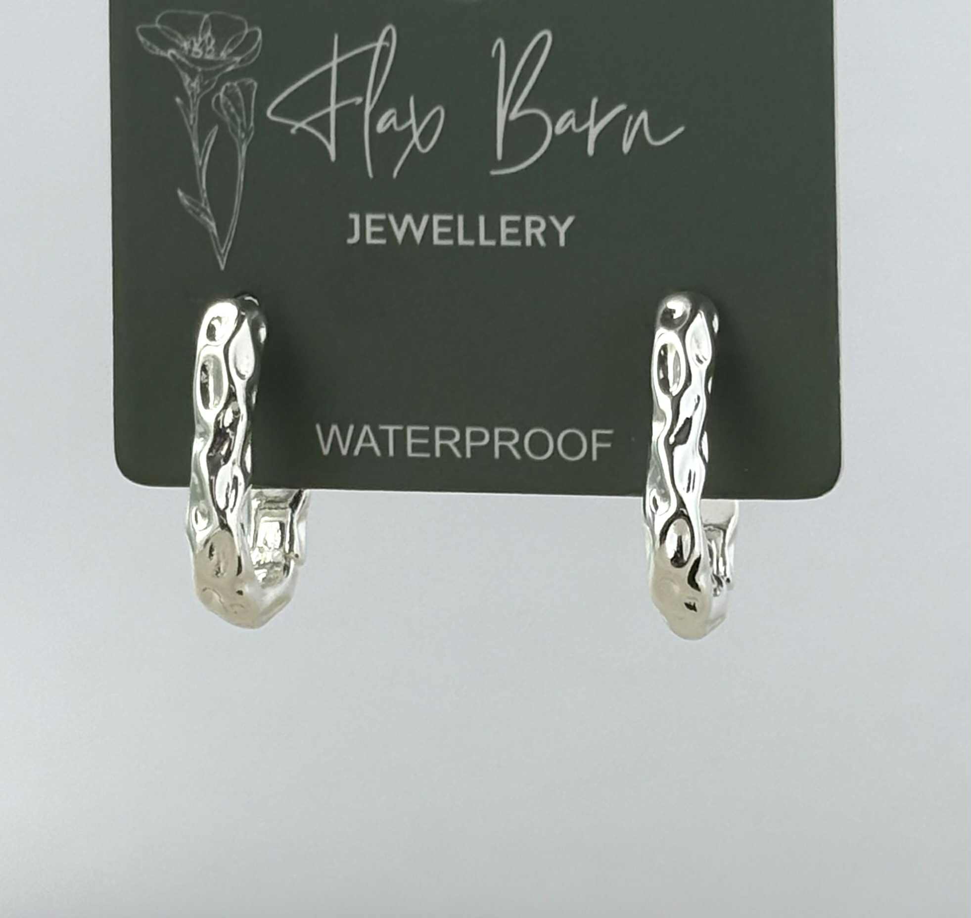 Wholesale Tarnish Resistant Oblong Dimpled Huggies for your store - Faire