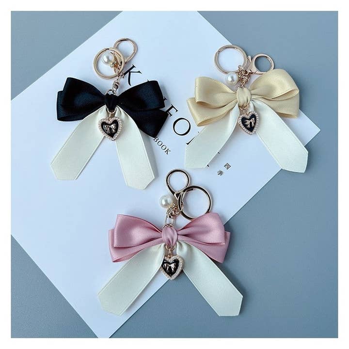 Contrast Bow Keychain Pendant and other Purchase Wholesale bow keychain. Free Returns & Net 60 Terms on Faire trending on Faire.