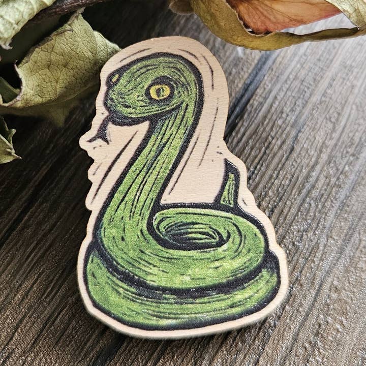 Wooden Danger Noodle Badge for wholesale by Minifi's Oddities