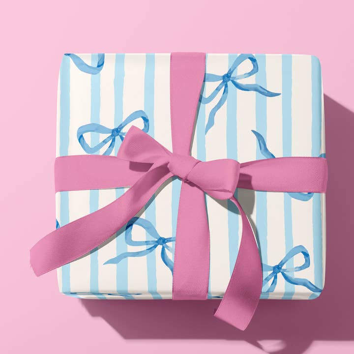 COQUETTE BLUE RIBBON GIFT WRAP SHEET for wholesale by Oh So Daisy