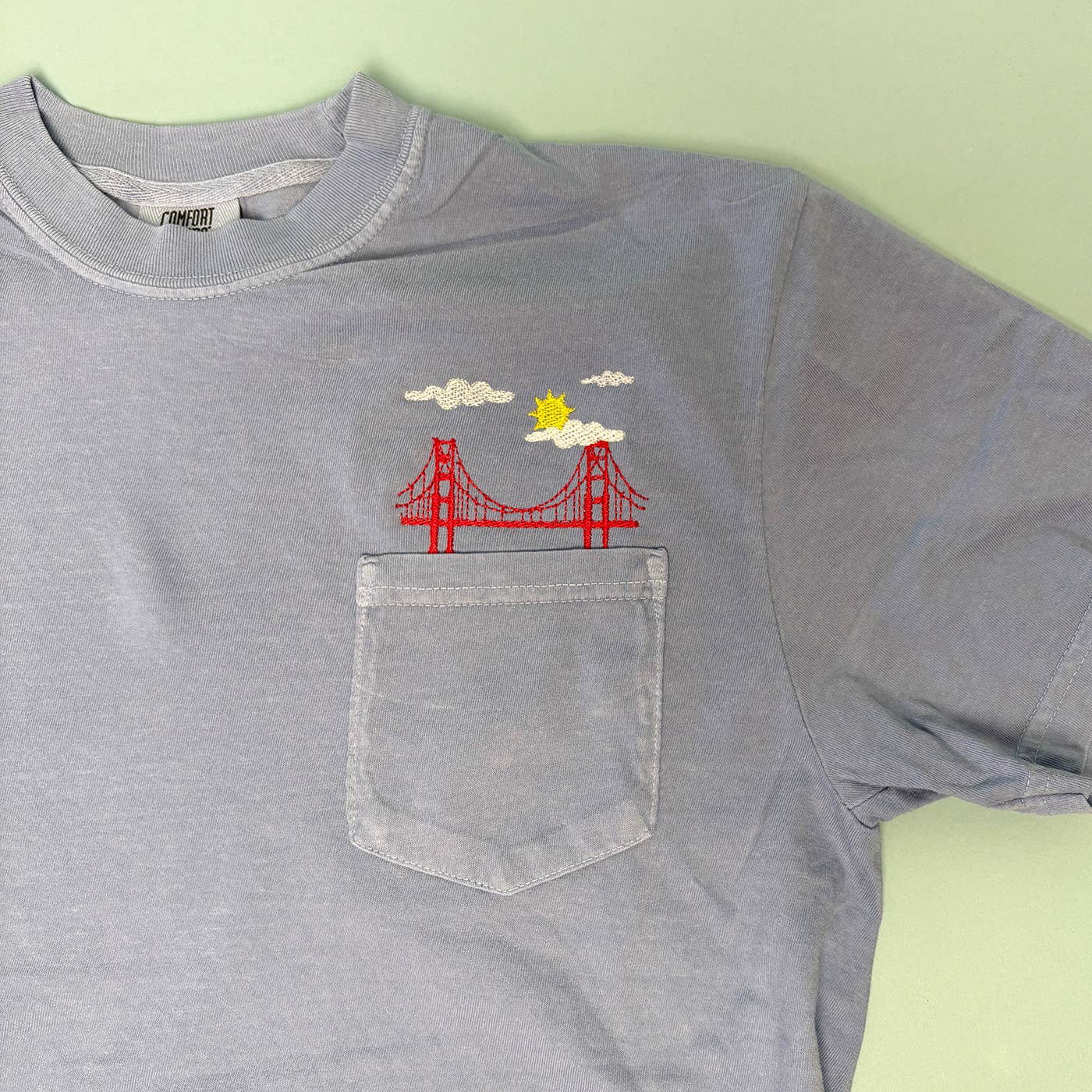 Animal Instincts - Wholesale T-Shirt - Unisex - San Francisco Bridge Embroidered Unisex Pocket Tee 4