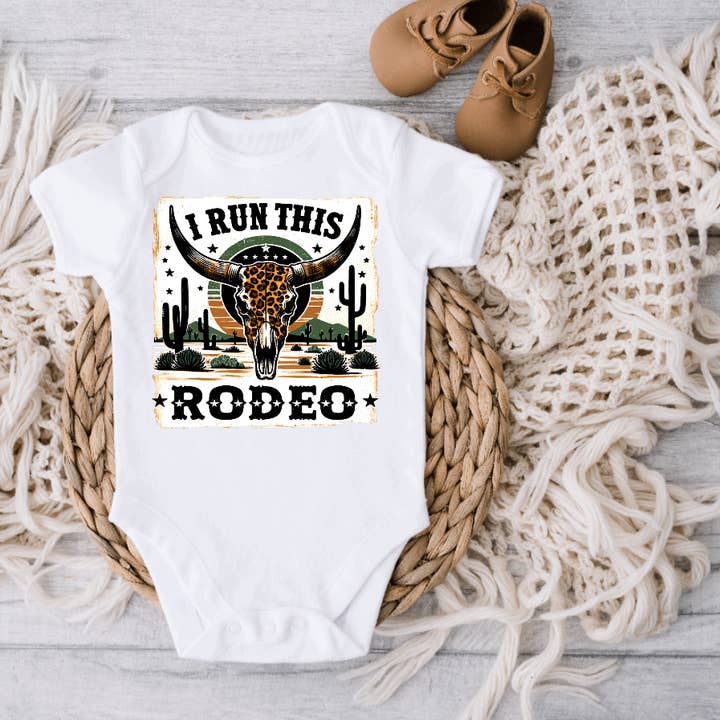 I Run this Rodeo Cheetah Western Baby Bodysuit Rodeo Onesie for wholesale by AvaryMaeInspirations