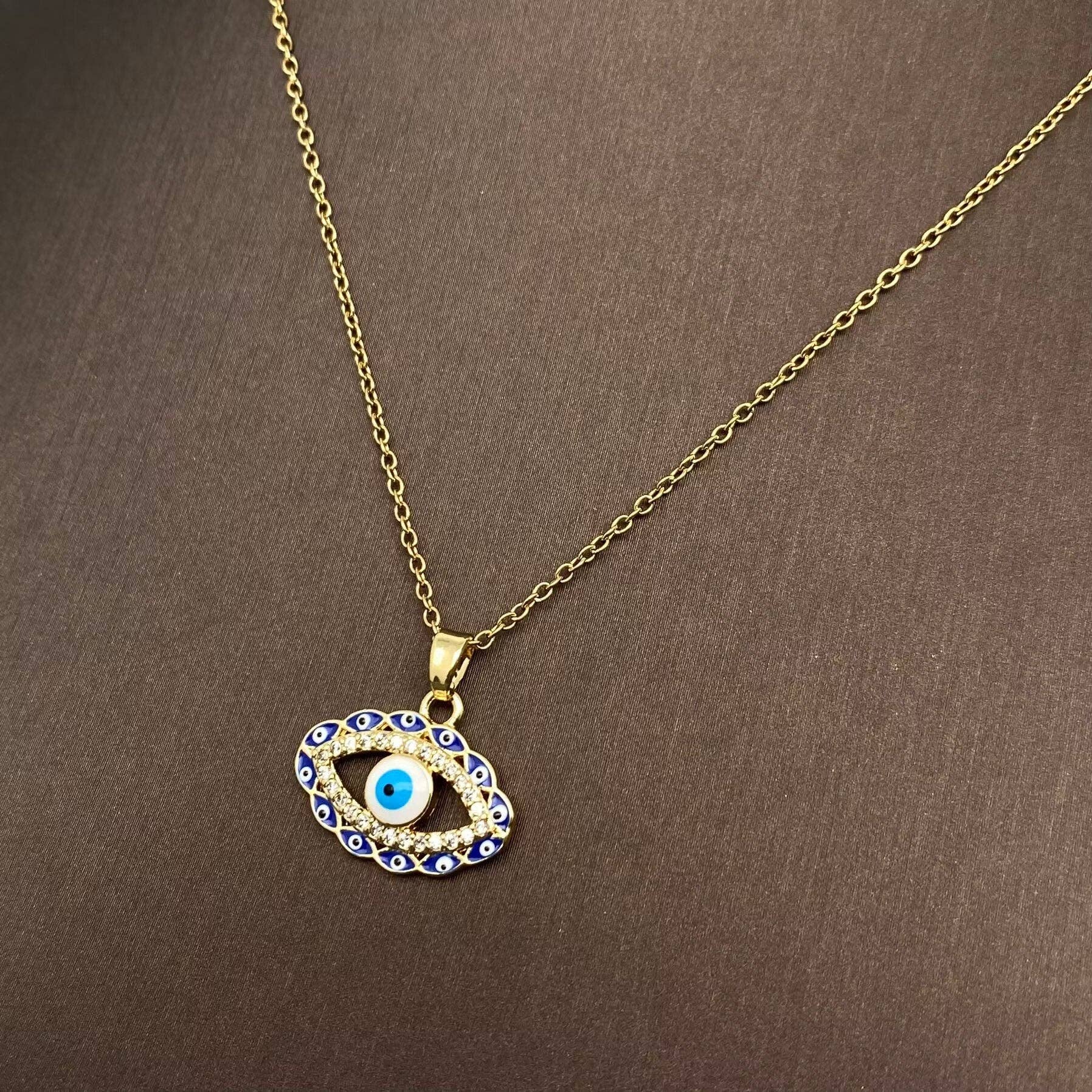 Mio Queena - Venta al por mayor Collares con colgantes/abalorios - Collar chapado en oro con colgante de ojos malvados con diamantes de imitación de varios estilos2