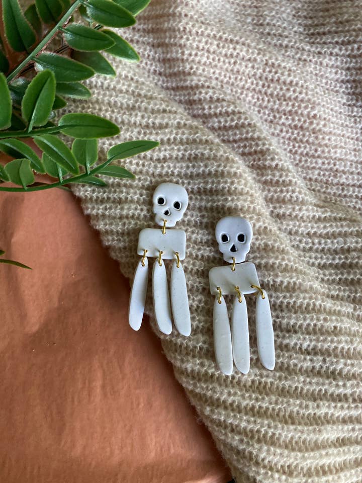 Skull dangle earrings for wholesale by Terra Made