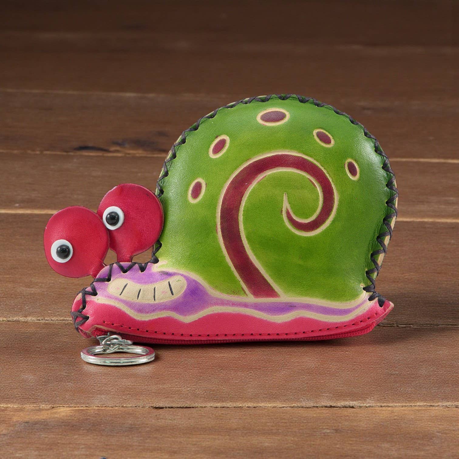 Sunflower Handmade leather inc - Venta al por mayor Bolso muñequera - Cartera de Mano de Cuero Hecha a Mano con Forma de Caracol2