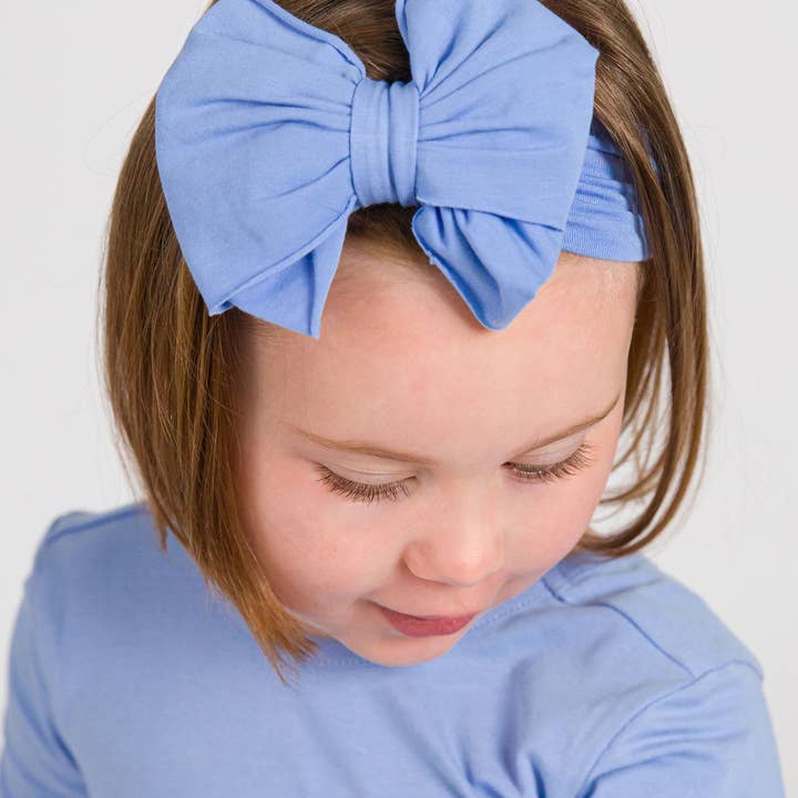 Girls Periwinkle Blue Big Bow Headband
for wholesale on Faire0