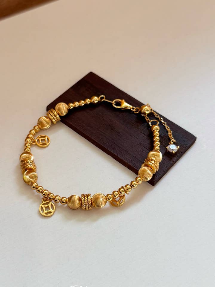 Møntarmbånd med Forgyldt Held og Lykke for engroshandel hos MINICYBER STUDIO