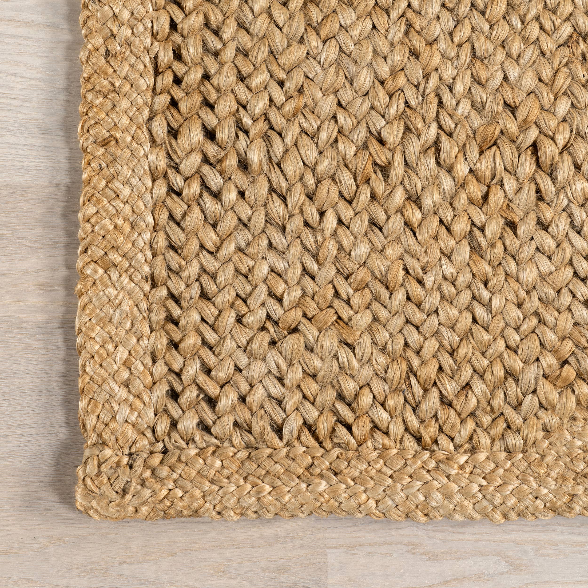 Natural Willow Bordered Jute Area Rug for wholesale on Faire2