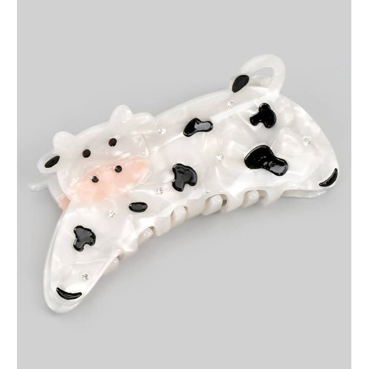 BARRETTE EN ACRYLIQUE MARBRÉE AVEC CLOUS EN POIL DE VACHE pour la vente par Girly