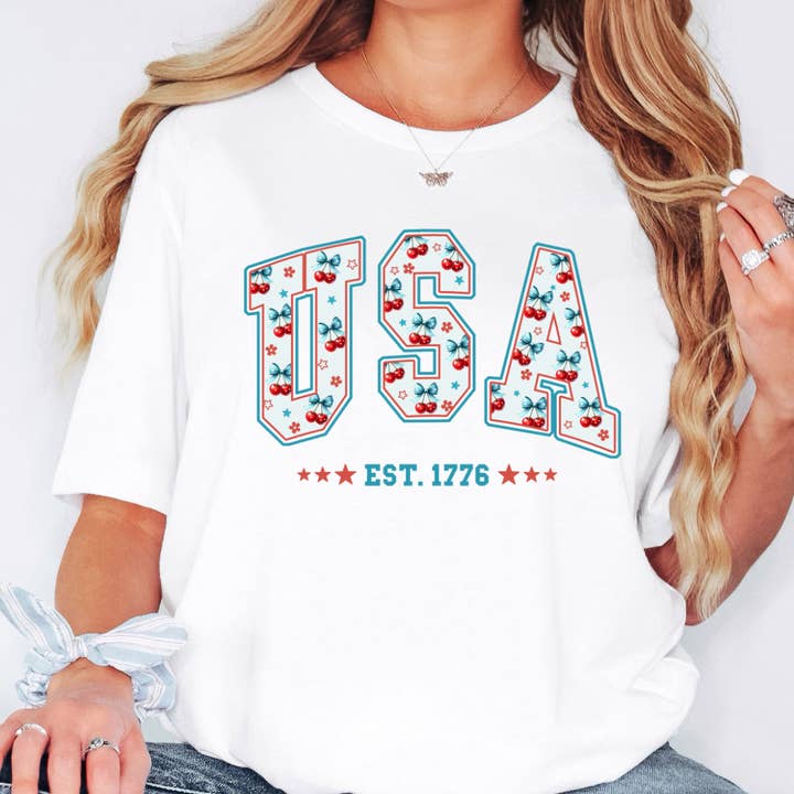 Maglietta con grafica USA 4 luglio per la vendita all'ingrosso da parte di Happy Mail Wholesale