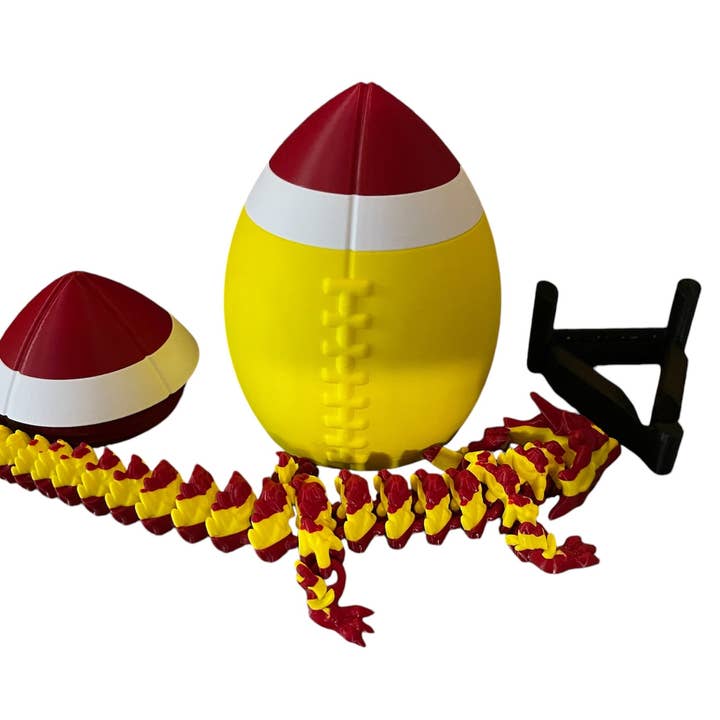 3D-Printed Football with Articulated Dragon Inside – A Unique Tribute to Your Team - Use as a fund raiser for school - Collect them all - Stress relief - ADHD - MADE IN THE USA for wholesale by Huckleberry Concepts