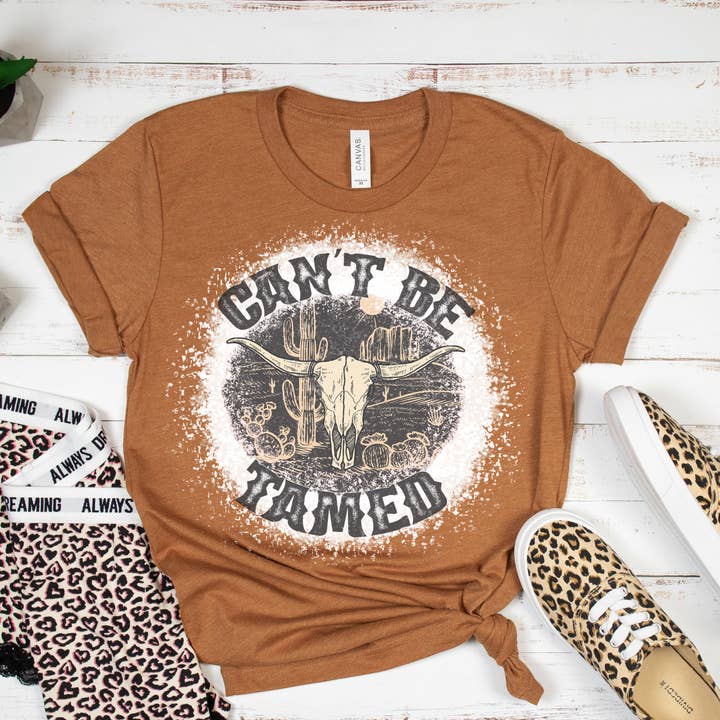 Can't Be Tamed T-shirt for wholesale by Rebelle Tree Boutique