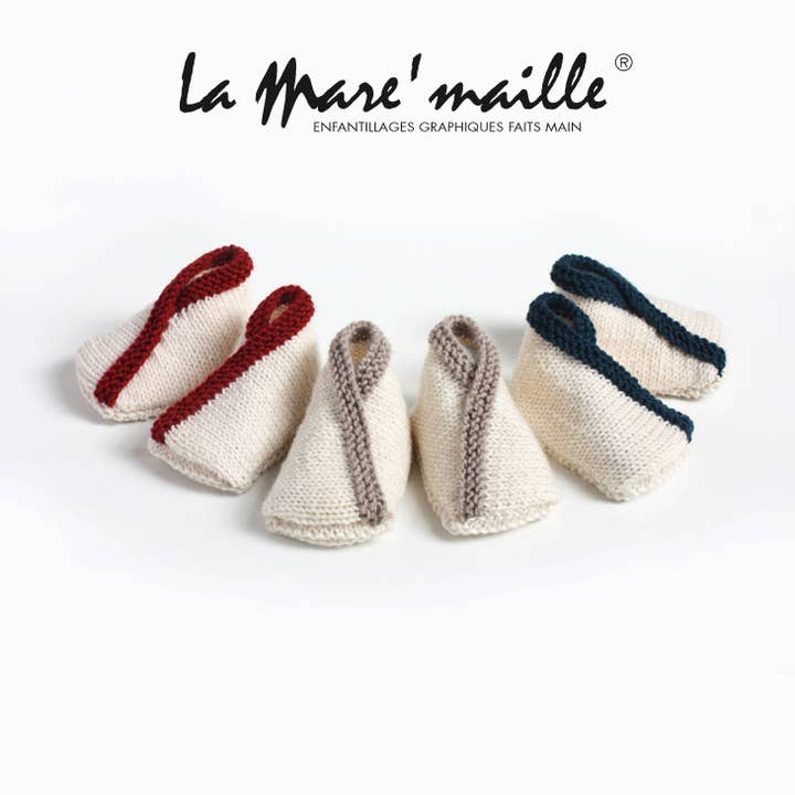 Hand knit ecru merino wool knitted baby slippers for wholesale by La Mare'maille® Hand-made