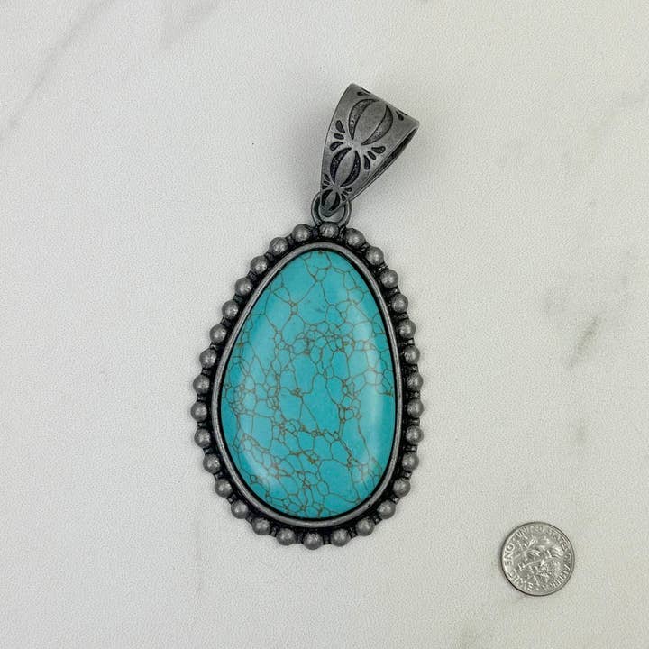 PDS230813-38 Pendentif en forme de larme en argent avec pierre turquoise bleue pour la vente par Western Elite Jewelry