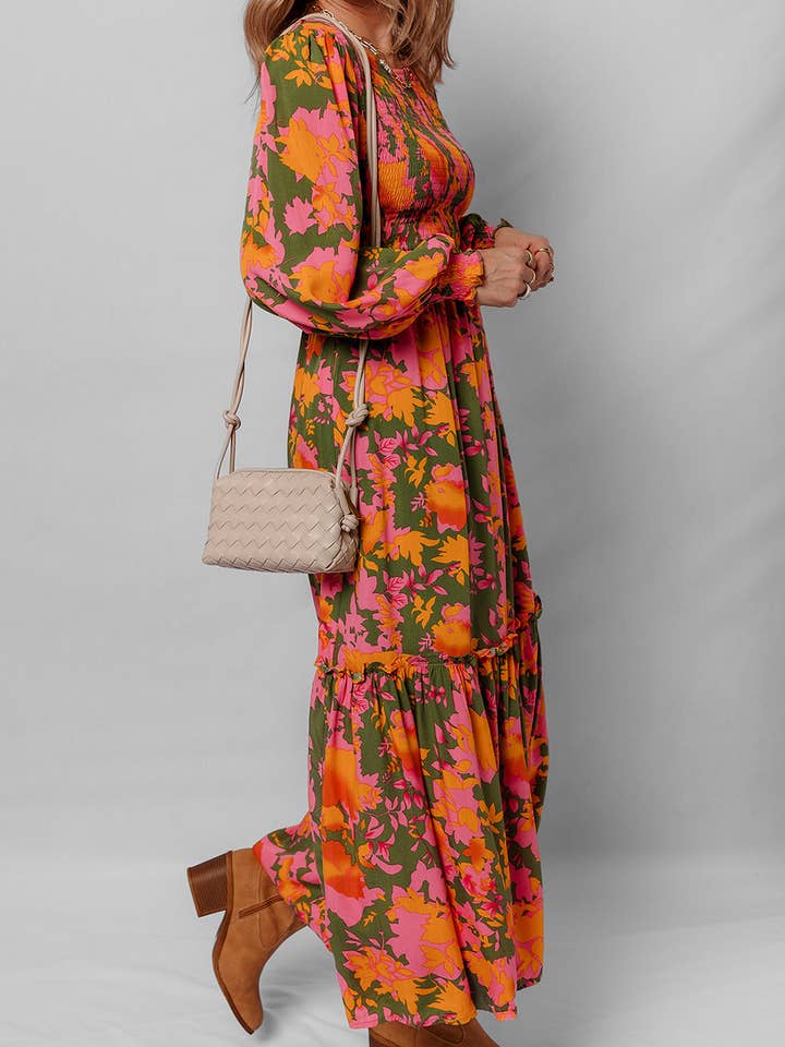 Orange Orange blommig klänning med puffärmar, smockad liv och volanger. för wholesale på Faire2