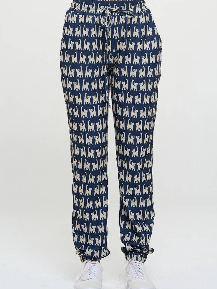 PANTALONI CON STAMPA DI GATTI per la vendita all'ingrosso da parte di SM WARDROBE