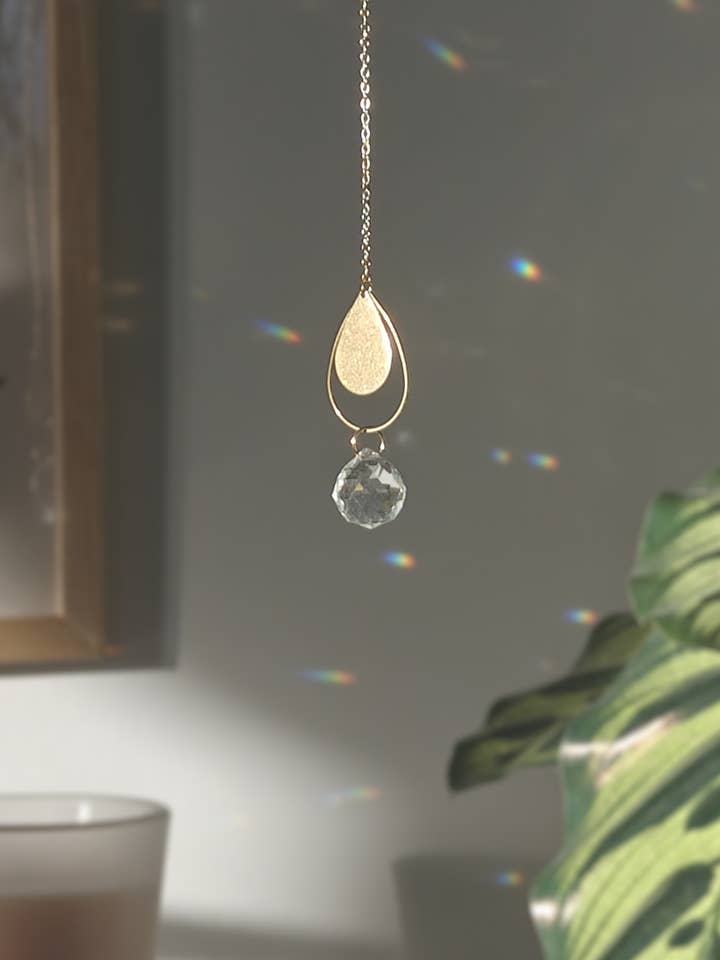 ASTRO WATER • Mini Suncatcher in Brass & Glass Crystal for wholesale by Atelier Intuitive