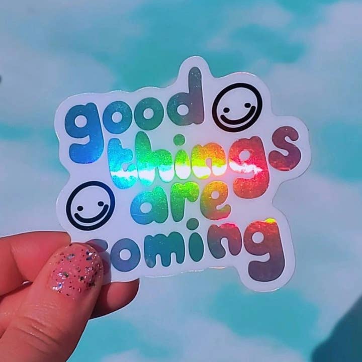 Good Things Are Coming Waterproof Vinyl Sticker, Motivational and Inspirational Quote, Aesthetic Happy Face Sticker for Laptop for wholesale by Prismatic Paper Co.
