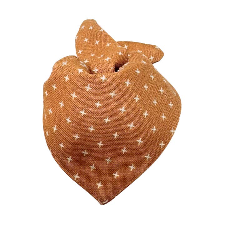 Bandana Bib - Caramel Crosses for wholesale by Huggabeau
