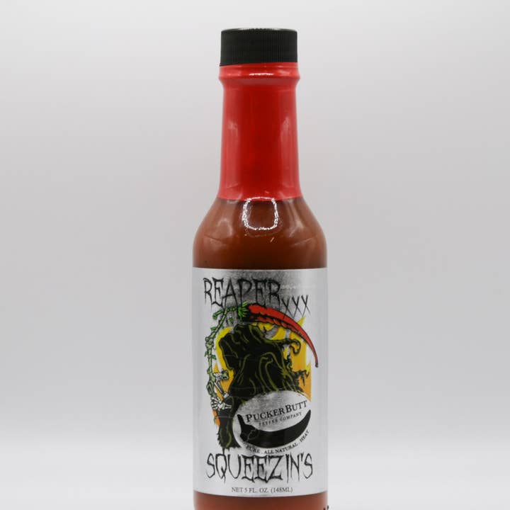 PuckerButt Extra Hot Squeezins Signé pour la vente par Smokin' Ed's