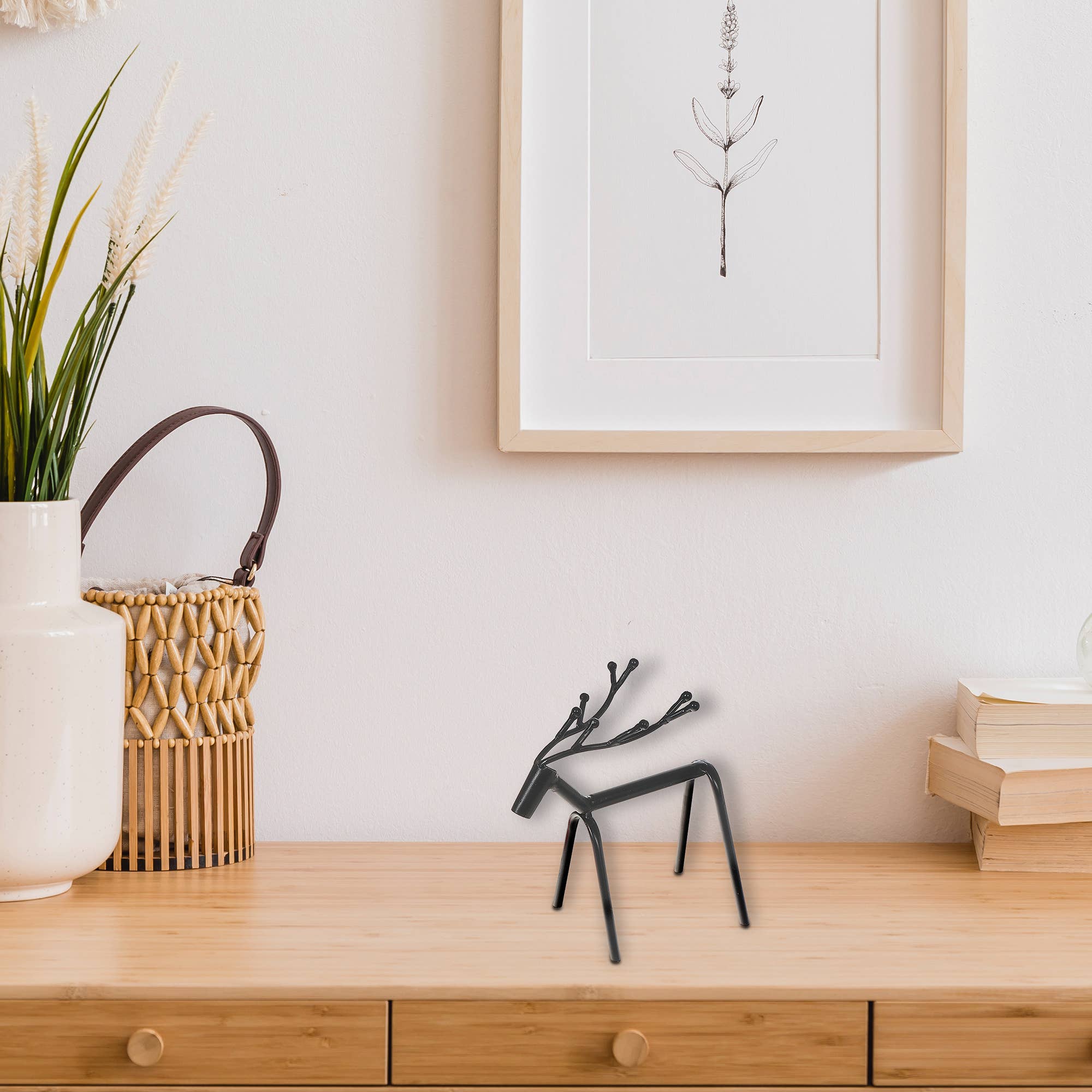 Black Metal Standing Deer Berry Antlers for wholesale on Faire1